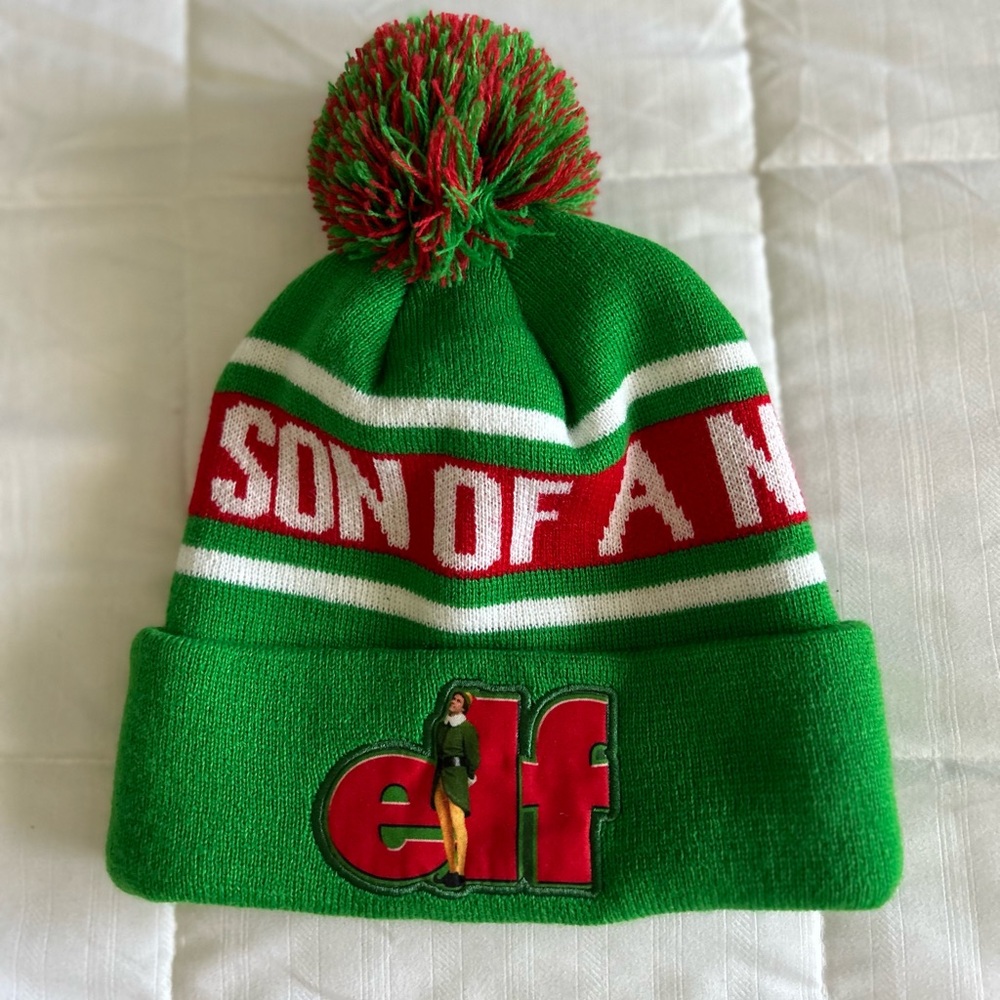 “NEW ELF SON OF A NUTCRACKER TOBAGGON